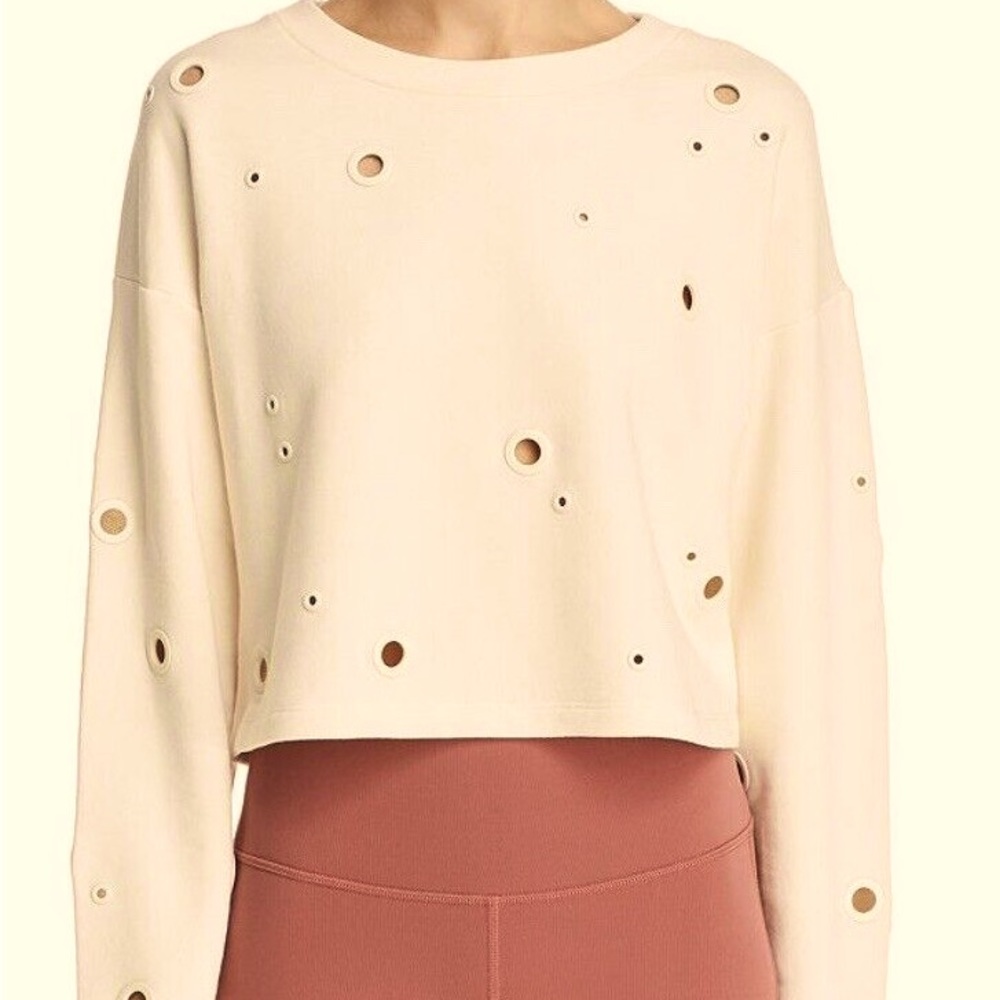 ALO Cadence grommet cropped sweatshirt in Peach. Size Medium.  Like new